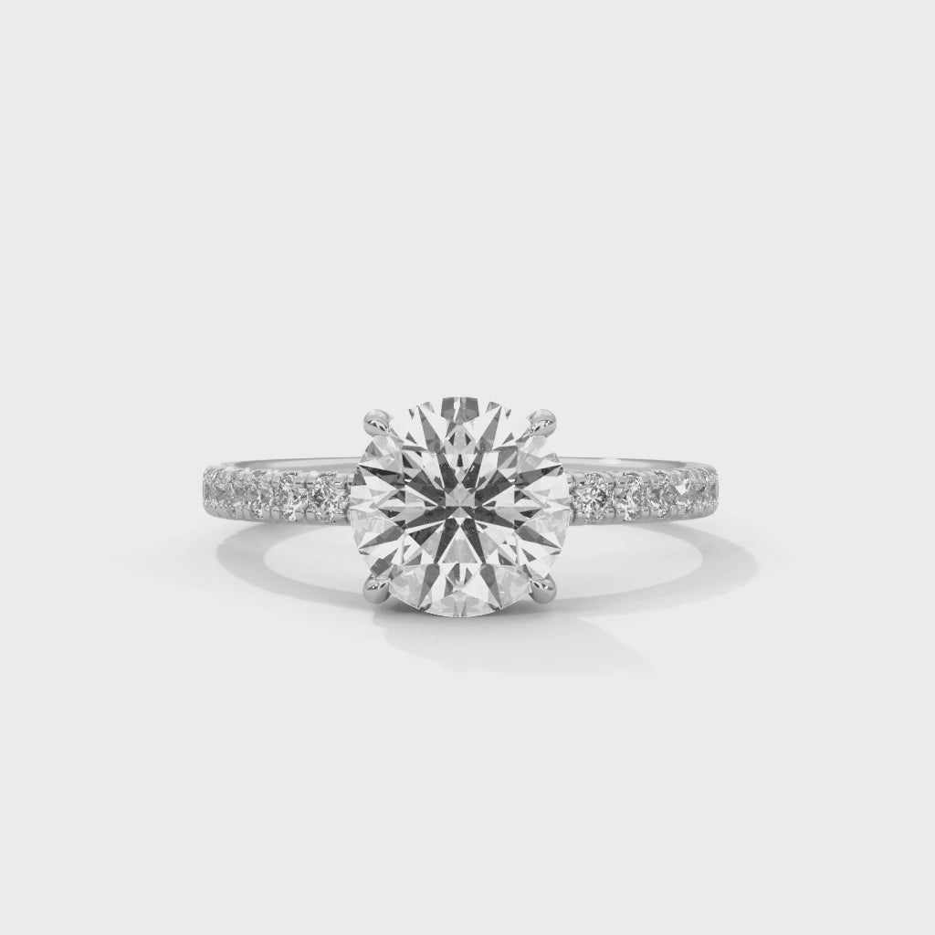 Round solitaire engagement ring