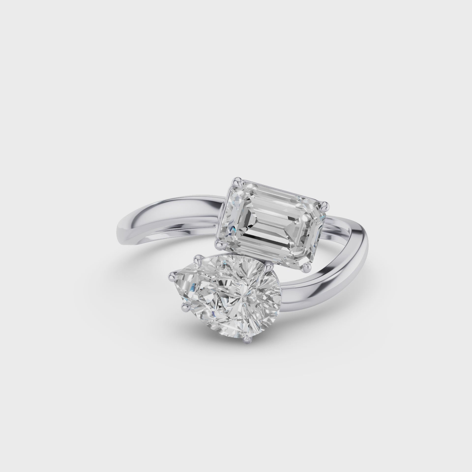 Toi et Moi Emerald And Pear Shape Sleek Design Diamond Ring