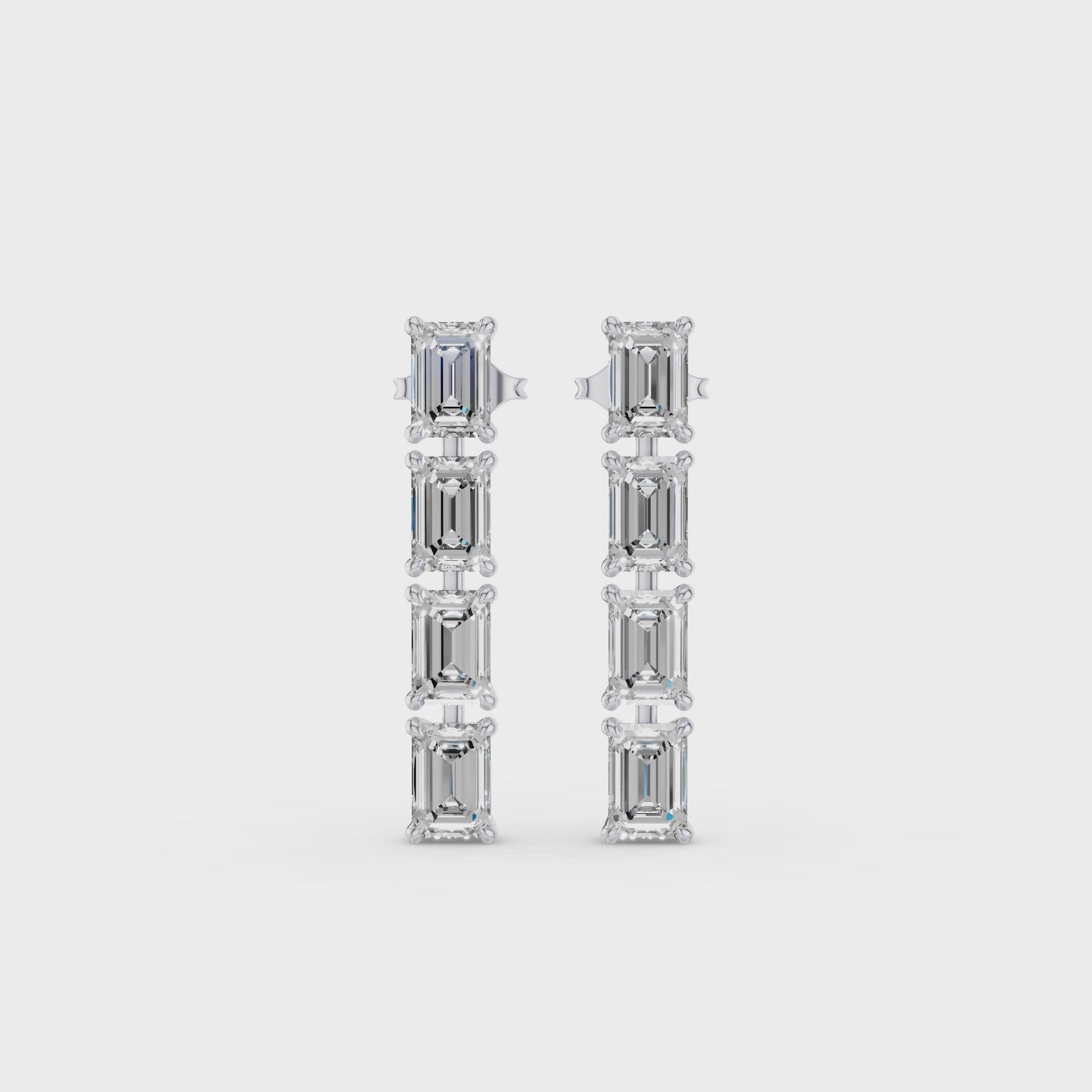 Emerald Cut Dangling Diamond Earrings