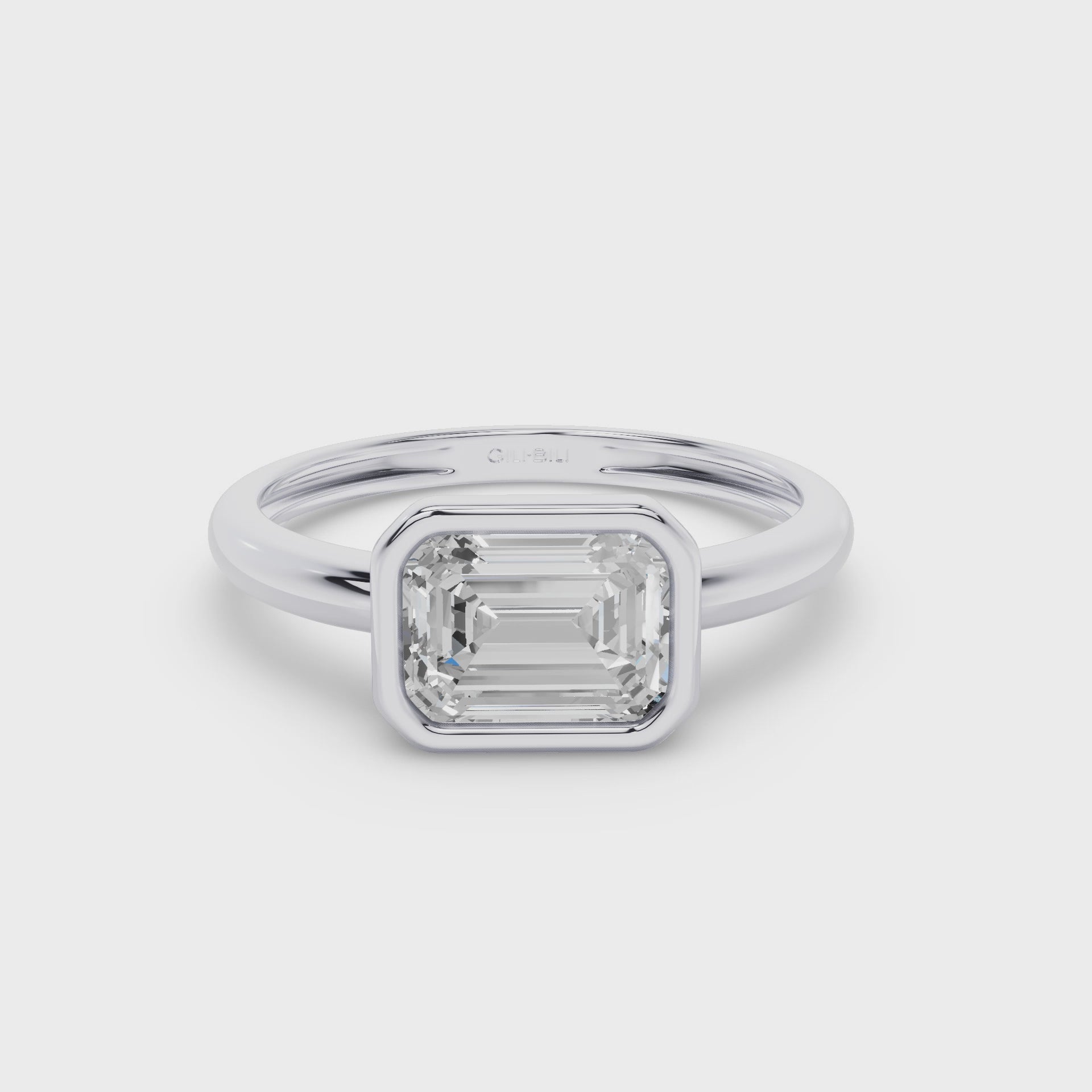 East West Emerald Cut Lab Grown Bezel Setting Engagement Ring