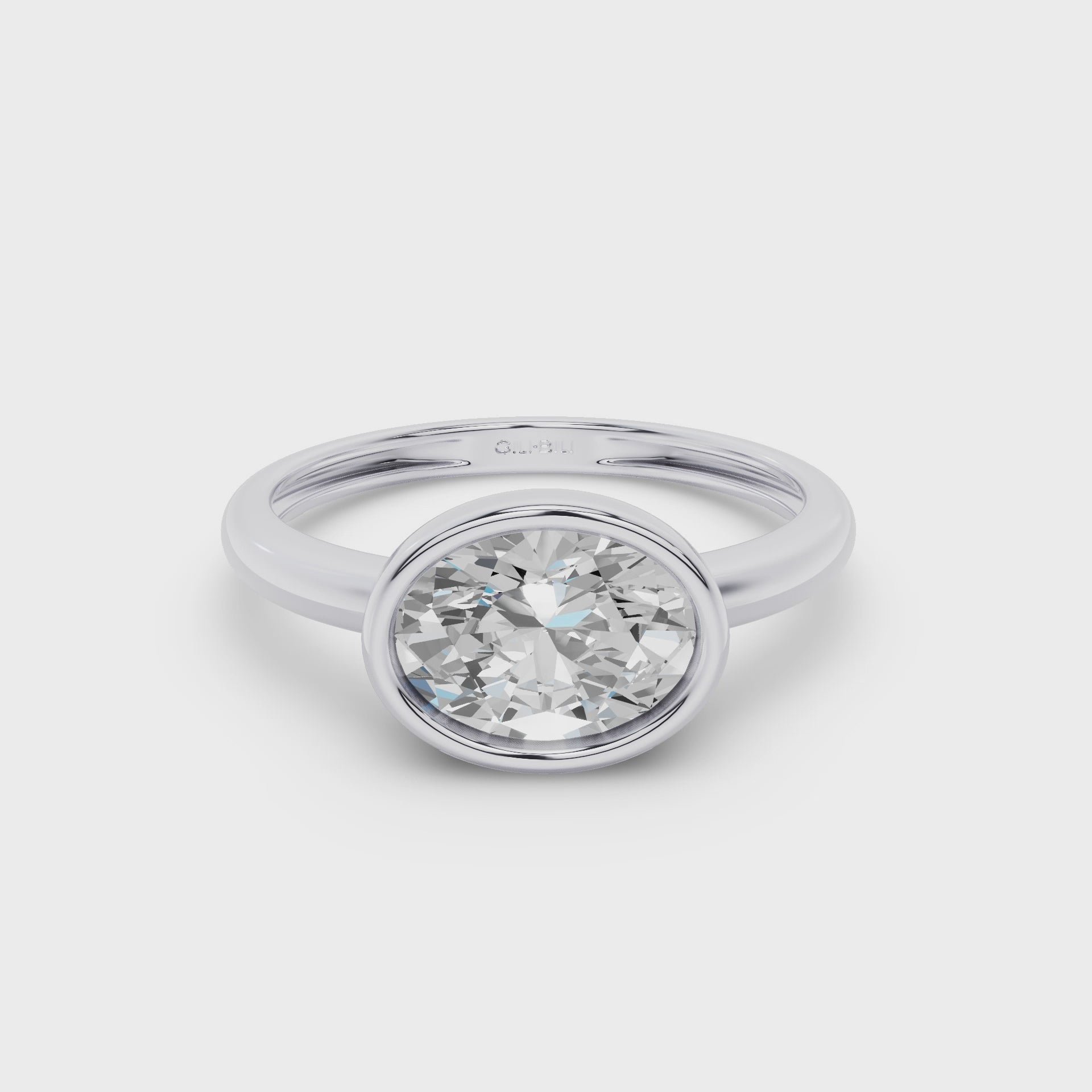 East West Classic Oval Shaped Lab Diamond Bezel Set Engagement Ring