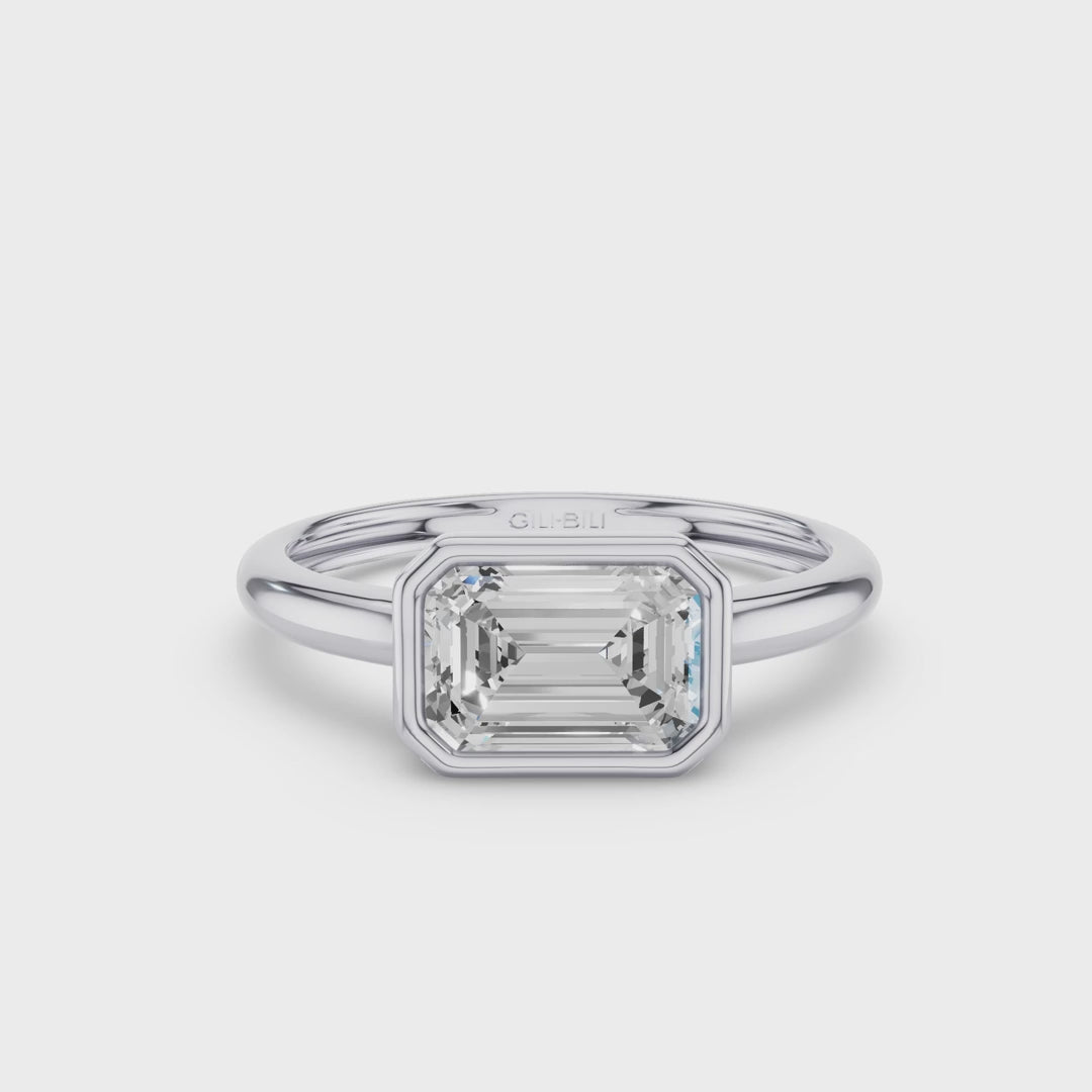 East West Emerald Cut Lab Grown Bezel Setting Engagement Ring