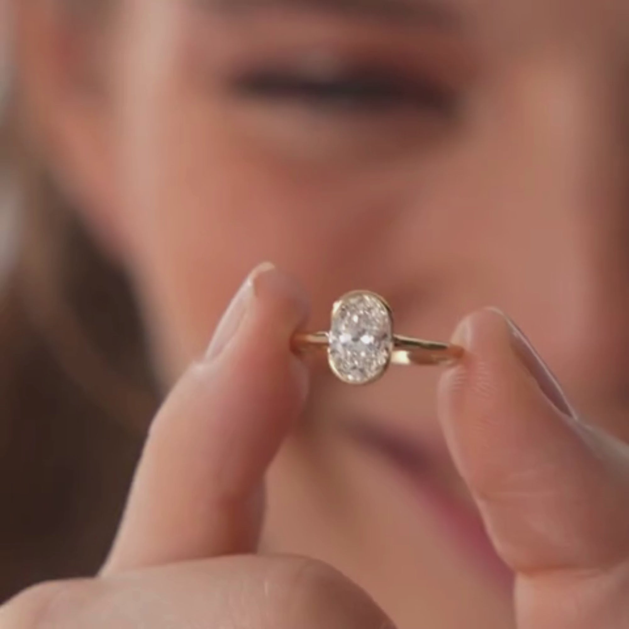 Oval Shaped Diamond Half Bezel Set Engagement Ring