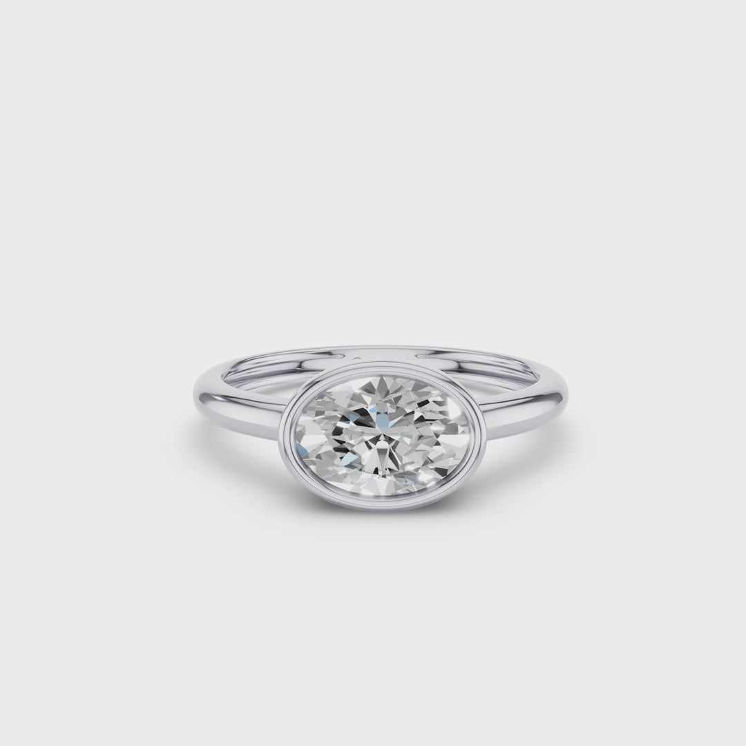 East West Classic Oval Shaped Lab Diamond Bezel Set Engagement Ring